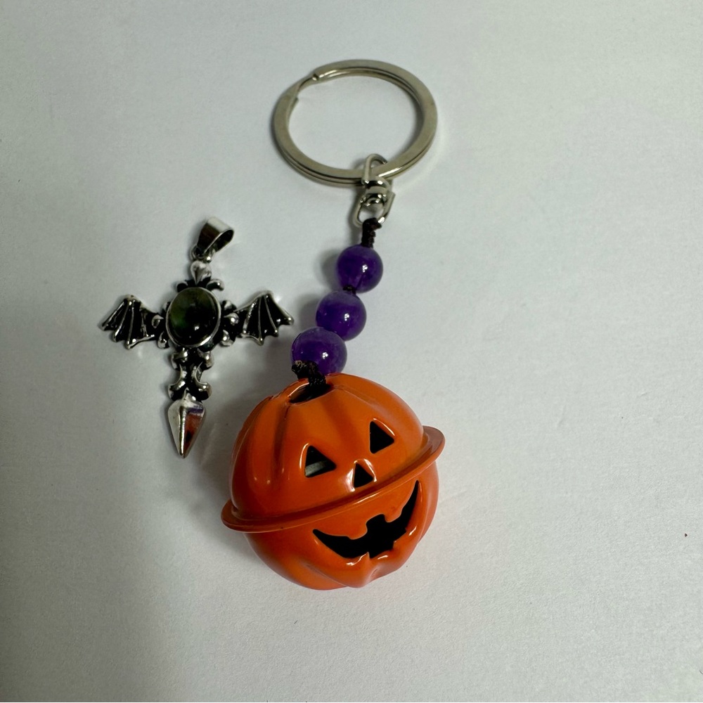 Pumpkin keychain with purple crystal beads and silver tone bat pendant